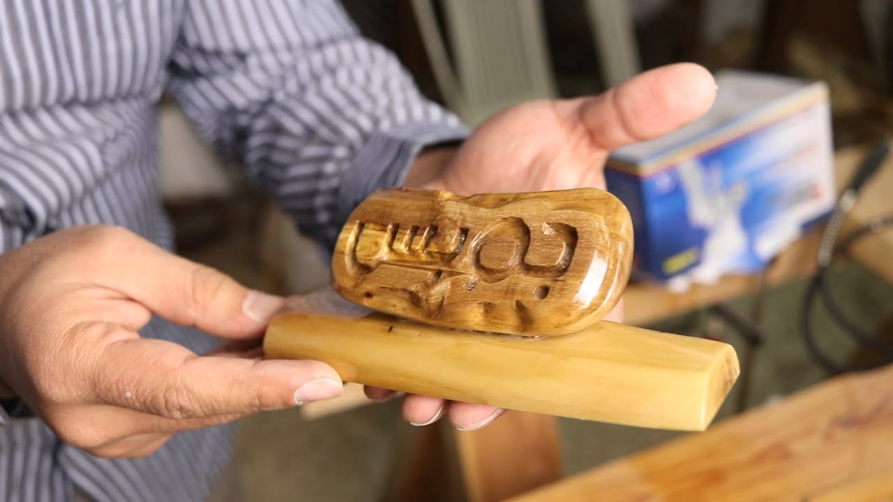 power carving wooden logo using olive wood - me @ level 0